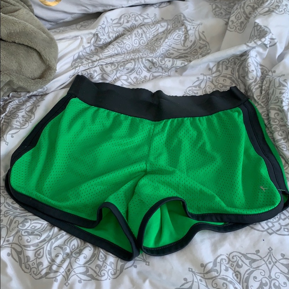 Green running shorts